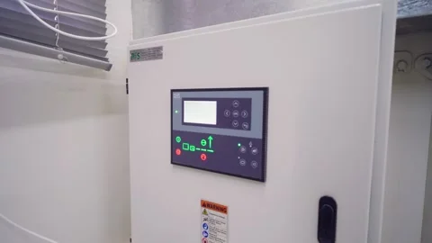 Solar system integration in a Karachi factory showcasing the clean energy Stock Footage 332480282