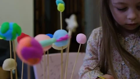 Solar system model hanging over the kid bed. DIY Stock Footage 279658815