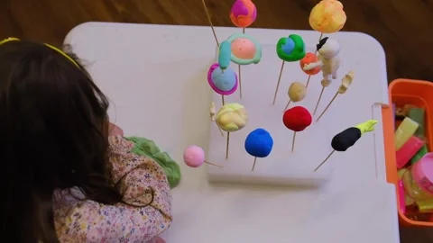 Solar system model hanging over the kid bed. DIY Stock-Footage 279658859