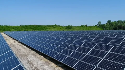 Solar system, solar panels in a field. Aerial view with drone Stock Footage 92290433