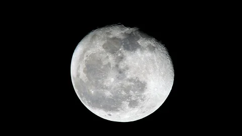 Solar system, waning moon in motion taken at the telescope Stock Footage 114365449