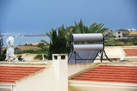 Solar water heating system on the rooftops. Stock Photos