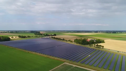 Solarfarm in Dutch fields Stock Footage 289908674