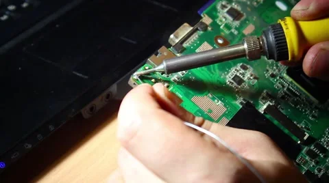 Solder the chip to the chip Stock Footage 64015982