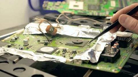 Soldering and reparing electronic circuit board Stock Footage 71132343