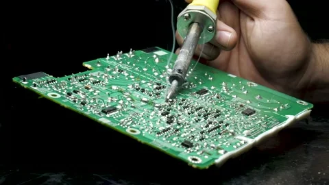 Soldering on circuit board Stock Footage 168449362