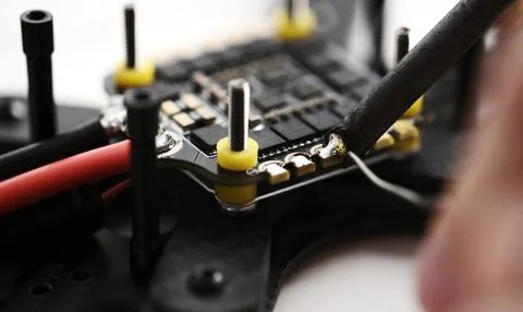 Soldering connections on microchip Foto stock