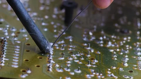 Soldering of contacts on the printed circuit board. Stock Footage 246747994