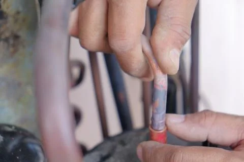 Soldering copper pipe Stock Photos