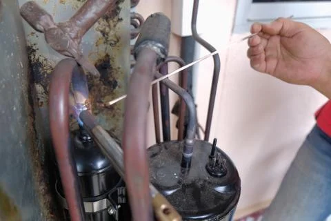 Soldering copper pipe Stock Photos
