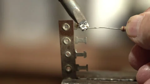 Soldering an electronic component for a design prototype Stock Footage 230525280