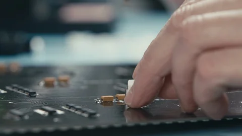 Soldering elements on the board Video stock 105378085