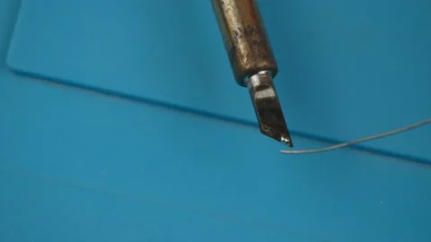 Soldering iron close-up melts the tin.The molten solder. 스톡 동영상 132016161