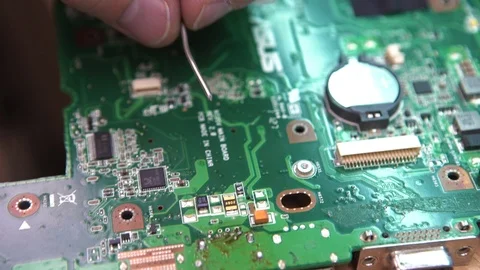 A Soldering Iron In His Hands. Technical Electronics Soldering motherboard engin Stock Footage 120016112