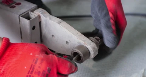 Soldering iron for plastic pipes automatic electric welding machine. Plumber's Video stock 150724428