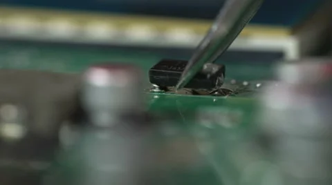 Soldering microchips and circuit boards Stock Footage 61643857