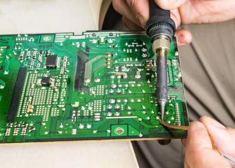 Soldering of old circuit Stock Photos