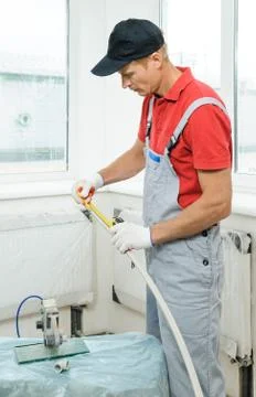 Soldering plastic pipe. Stock Photos