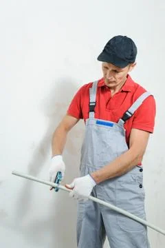 Soldering plastic pipe. Stock Photos