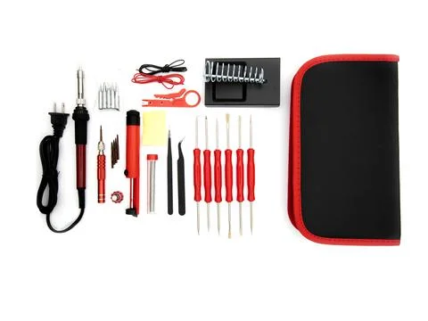 A soldering toolset in a black case isolated in a white background.Black bag  Stock Photos