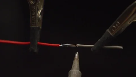 Soldering Two Wires Slow Motion RED 4K Stock Footage 114126174