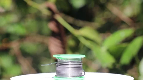 Soldering wire also called as lead used to solder electronic components Video stock 308267053
