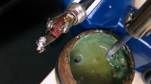 Soldering wire to plug, close up shot Stock Footage 35155718