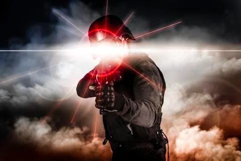 Soldier aiming assault rifle laser sight Фото