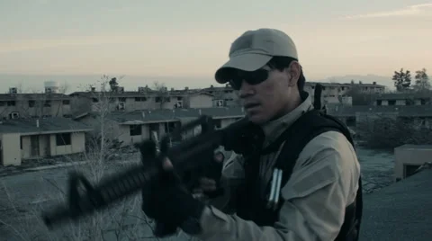 Soldier Aiming Rifle on Rooftop Stock Footage 47922498