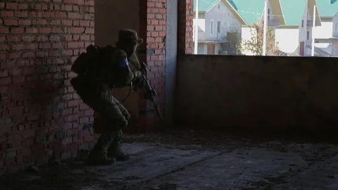 Soldier is aiming at the target during the mission Stock Footage 81672051