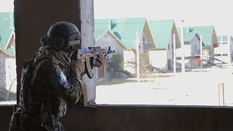 Soldier is aiming at the target during the mission Stock Footage 81672097