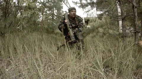 Soldier aims a RPG in the forest Stock Footage 68450980