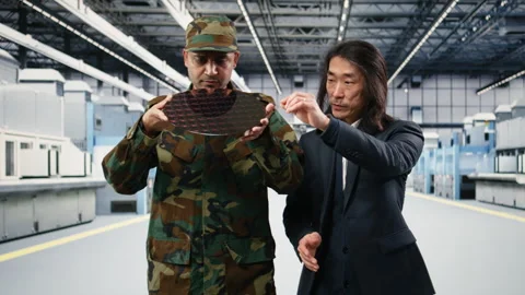 Soldier and microchip factory manager increase semiconductor production Stock Footage 333393302