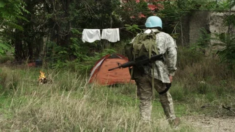 SOLDIER ARRIVING AT CAMP Stock Footage 172223652