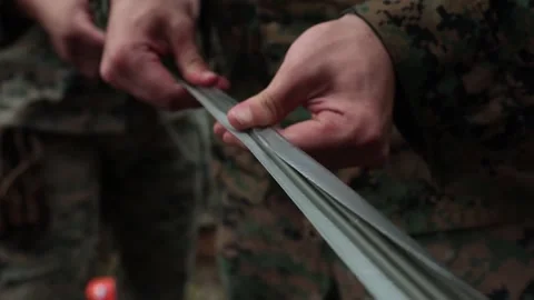 Soldier assembling a demolition charge Stock Footage 288190258
