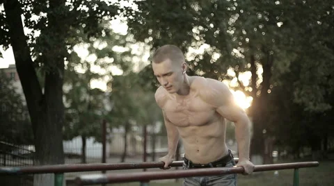 Soldier athlete pulls on the bar. Long shot Stock Footage 40540041