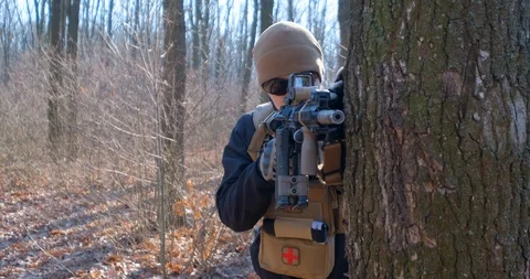 Soldier in the autumn forest Stock Footage 124637071