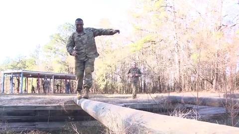 Soldier balancing on pole during basic training at Fort Benning, Georgia Stock Footage 82937240