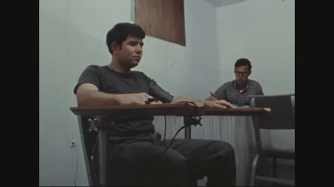 Soldier being given a lie detector test in polygraph examination room - 1972 Stock Footage 97906550