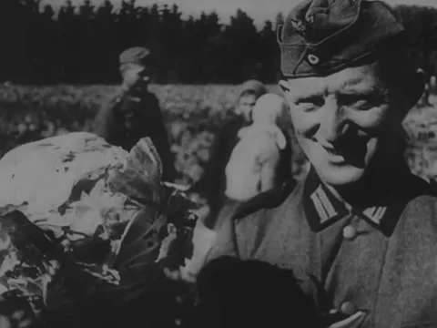 Soldier bounces cabbage Stock Footage 221533020