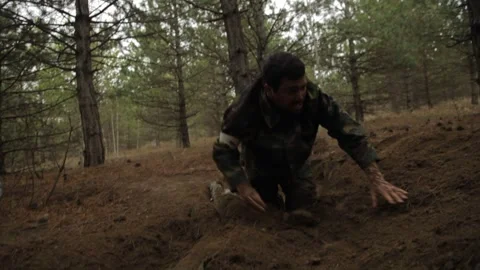 A soldier buries his fallen comrade 11 Stock Footage 323019003