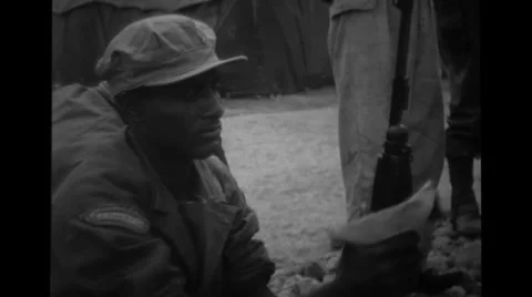 Soldier cleaning the rifle Stock Footage 36302170