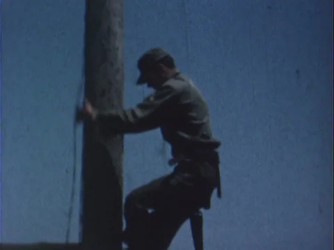 Soldier Climbing Up and Down Pole - Vintage 8mm Stock Footage 78924212