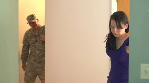 Soldier coming home and hugging his wife Stock Footage
