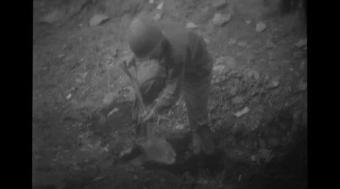 A soldier digging pit Stock Footage 36420588