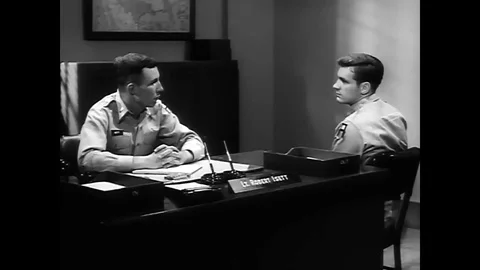 A soldier discusses a problem hes having with his Commanding Officer at basic Stock Footage 100996488