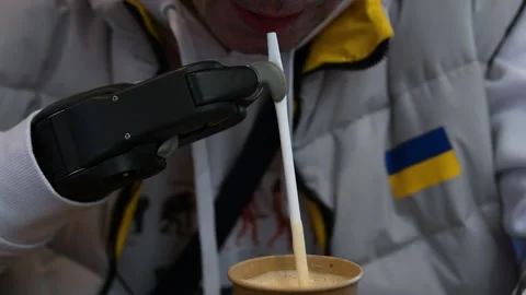 Soldier Drinks Coffee with Bionic Hand After Limb Loss in Kyiv, Ukraine 스톡 동영상 312256477
