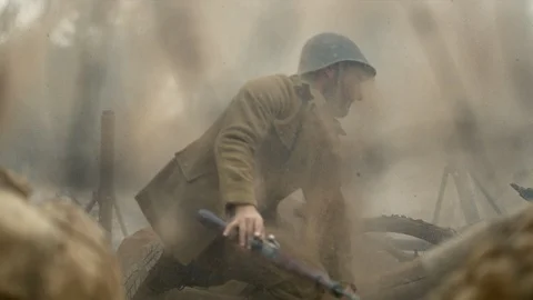 Soldier falling on the ground, slow motion Stock Footage 86462243