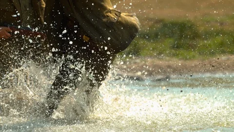 Soldier falling into the river, slow motion Stock Footage 86464515