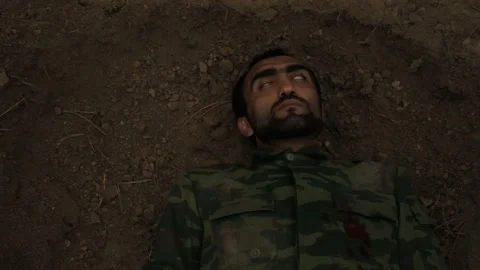 The soldier falls to the ground 1 Stock Footage 323016862